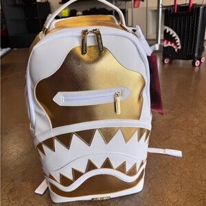 Sprayground Couture Regalia DLXSV Gold and White Shark-Mouth Backpack